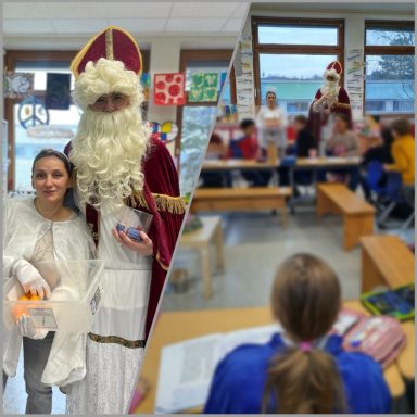 Nikolaus mit einem Helfer Engel in der Schule